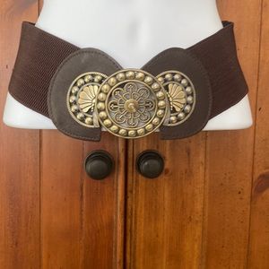 Belt with buckle for the front elastic around the waist so can go bigger